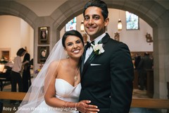 Sweet indian couple leaving wedding ceremony Sweet indian couple leaving wedding ceremony