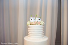 Lovely Indian wedding cake topper decor. Lovely Indian wedding cake topper decor.