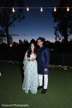 Glamorous Indian couple posing outdoors. Glamorous Indian couple posing outdoors.