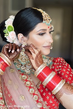 Maharani putting on her earrings capture. Maharani putting on her earrings capture.