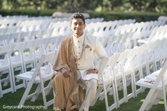 Charming Indian groom posing outdoors. Charming Indian groom posing outdoors.