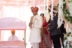 Indian groom guiding bride at ceremony ritual. Indian groom guiding bride at ceremony ritual.