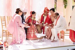 Indian couple making offerings to sacred fire. Indian couple making offerings to sacred fire.