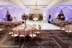 Phenomenal Indian wedding stage, table and dance floor setup. Phenomenal Indian wedding stage, table and dance floor setup.