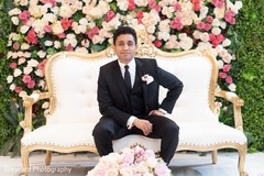 Indian groom posing at his reception stage. Indian groom posing at his reception stage.