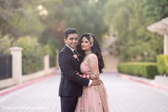 Romantic Indian bride and groom hugging each other. Romantic Indian bride and groom hugging each other.