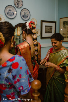 Maharani getting her hair decorations. Maharani getting her hair decorations.
