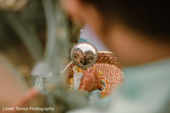Indian bride and groom looking in the mirror ritual. Indian bride and groom looking in the mirror ritual.