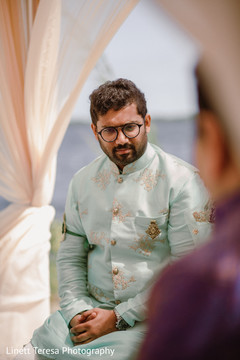 Charming Indian groom's capture at ceremony. Charming Indian groom's capture at ceremony.