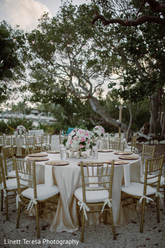 Elegant Indian wedding reception table setup. Elegant Indian wedding reception table setup.