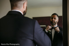 Enhancing groom getting ready for wedding ceremony Enhancing groom getting ready for wedding ceremony