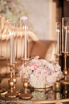 Graceful indian wedding reception floral table centerpiece. Graceful indian wedding reception floral table centerpiece.