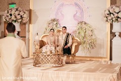 Adorable indian newlyweds at reception speech. Adorable indian newlyweds at reception speech.