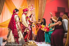 Indian bride and groom walking around sacred fire. Indian bride and groom walking around sacred fire.