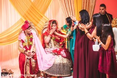 Indian bride being cover with with special veil. Indian bride being cover with with special veil.