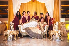 Sweet Indian bride and bridesmaids posing for photo shoot. Sweet Indian bride and bridesmaids posing for photo shoot.