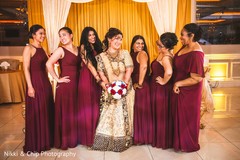 Joyful indian bride with bridesmaids capture. Joyful indian bride with bridesmaids capture.