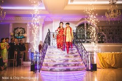 Indian newlyweds making their entrance to wedding reception Indian newlyweds making their entrance to wedding reception
