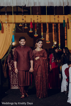Indian bride and groom entering Indian bride and groom entering