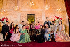 Family posing with couple Family posing with couple