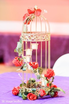 Marvelous cage decoration for sangeet table decor. Marvelous cage decoration for sangeet table decor.