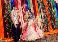 Romantic Indian couple at sangeet dance. Romantic Indian couple at sangeet dance.
