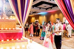 Lovely Indian couple looking at Goddess stage. Lovely Indian couple looking at Goddess stage.