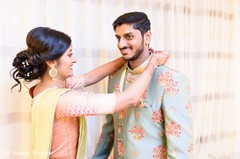 Indian groom getting his mala on. Indian groom getting his mala on.