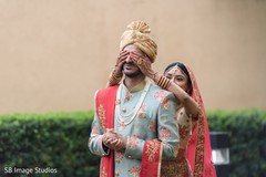 Maharani surprising the groom. Maharani surprising the groom.