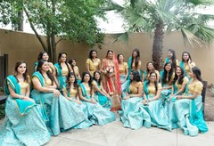 Sweet indian bride posing with her bridesmaids. Sweet indian bride posing with her bridesmaids.
