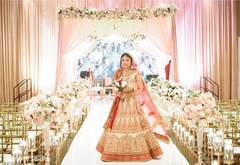 Indian bride posing on her ceremony aisle. Indian bride posing on her ceremony aisle.