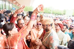 Indian groom being blessed by bride's relatives. Indian groom being blessed by bride's relatives.
