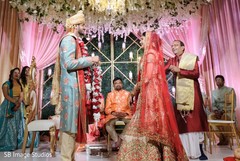 Indian bride and groom at their Jaimala Ceremony. Indian bride and groom at their Jaimala Ceremony.