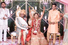 Fun Indian wedding ritual during ceremony capture. Fun Indian wedding ritual during ceremony capture.