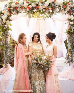 Glamorous indian bride posing with her bridesmaids. Glamorous indian bride posing with her bridesmaids.
