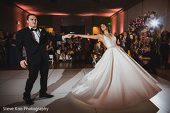 Indian bride and groom dancing Indian bride and groom dancing