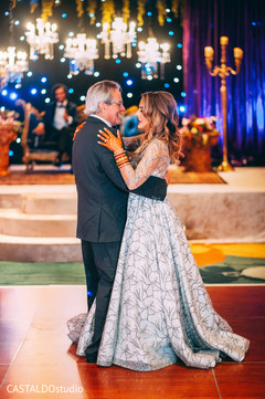 Indian bride dancing with her father capture. Indian bride dancing with her father capture.