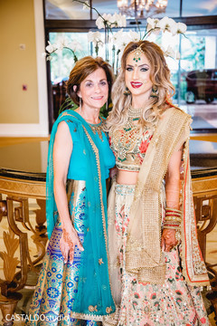 Sweet Indian bride and relative posing for photo shoot. Sweet Indian bride and relative posing for photo shoot.