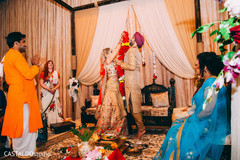 Traditional Indian bride and groom's jaimala ceremony. Traditional Indian bride and groom's jaimala ceremony.