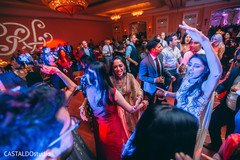 Guests at the indian wedding reception dance. Guests at the indian wedding reception dance.