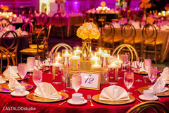 Dreamy indian wedding reception table flower and candle decoration. Dreamy indian wedding reception table flower and candle decoration.