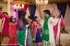 Indian bride and groom dancing Indian bride and groom dancing