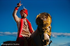 Indian groom riding a horse Indian groom riding a horse