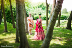 Indian bride and groom posing for pictures Indian bride and groom posing for pictures