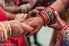 Closeup capture of maharani's chooras and mehndi art. Closeup capture of maharani's chooras and mehndi art.