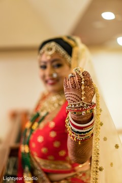 Indian bride showing her ceremony bracelets. Indian bride showing her ceremony bracelets.