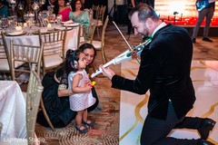 Lovely capture of Indian wedding violinist playing. Lovely capture of Indian wedding violinist playing.