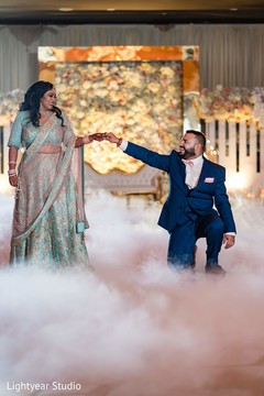 Romantic Indian couple having their first dance. Romantic Indian couple having their first dance.