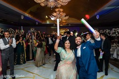 Dazzling dance of Indian bride and groom during reception Dazzling dance of Indian bride and groom during reception
