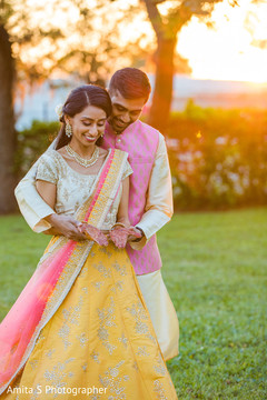 Lovely Indian bride and groom admiring mehndi art. Lovely Indian bride and groom admiring mehndi art.